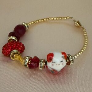 Bracelet charm bracelet used like new 
 Inspired by Maneki-Neko (Lucky Cat)